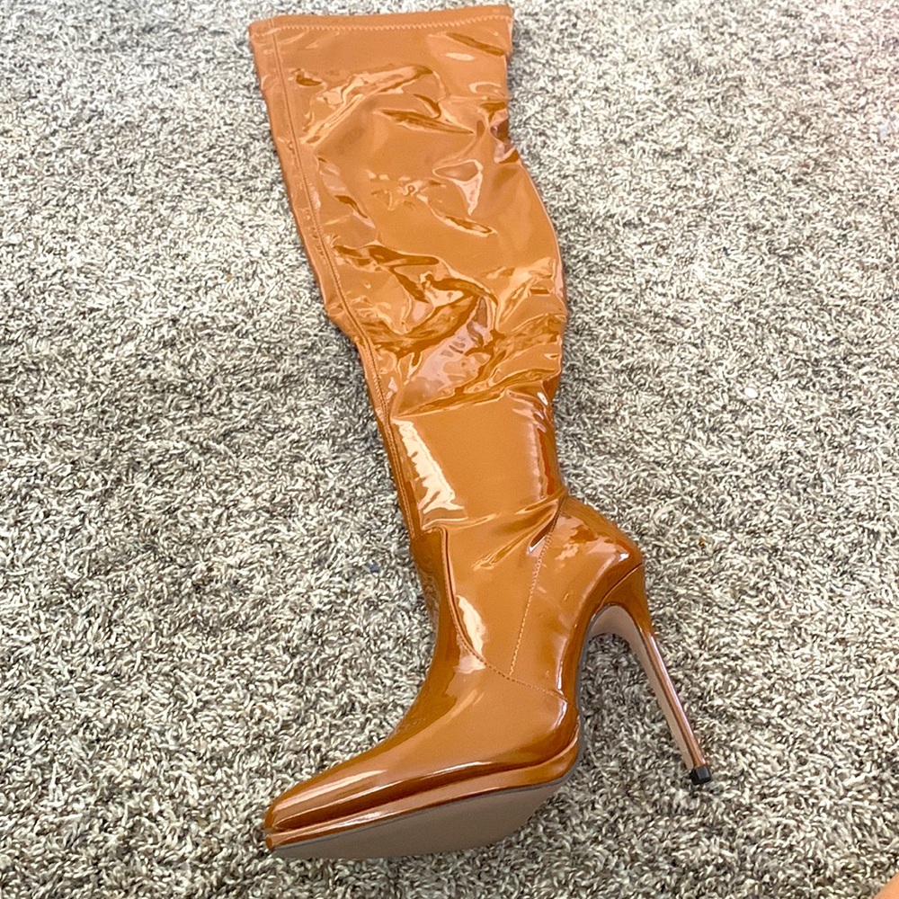 Thigh high camel patented boot